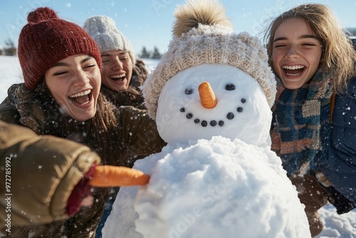 Laughter and joy fill the air as friends complete their snowman creation, captured in playful delight, wearing warm winter clothes, in a bright snowy environment. photo