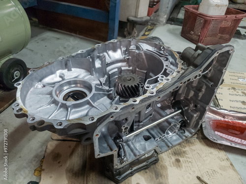 automatic transmission housing being dismantled, car transmission