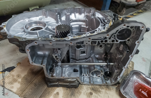 automatic transmission housing being dismantled, car transmission