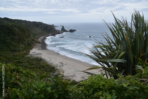 Hiking along the Punakaiki River Track and coastline in the Paparoa National Park, New Zealand photo