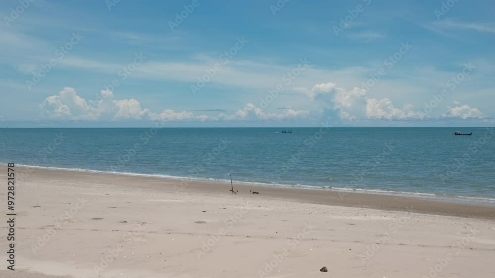 White beach with traditional boat in tropical sea in sunny day White beach with traditional boat in tropical sea in sunny day