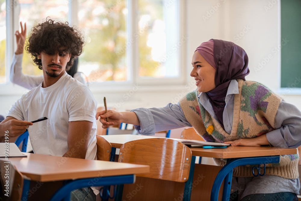 Fototapeta premium In the classroom group of diverse college students engages in discussion and knowledge exchange.