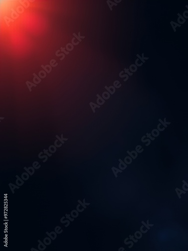 Red light flares through a dark background.