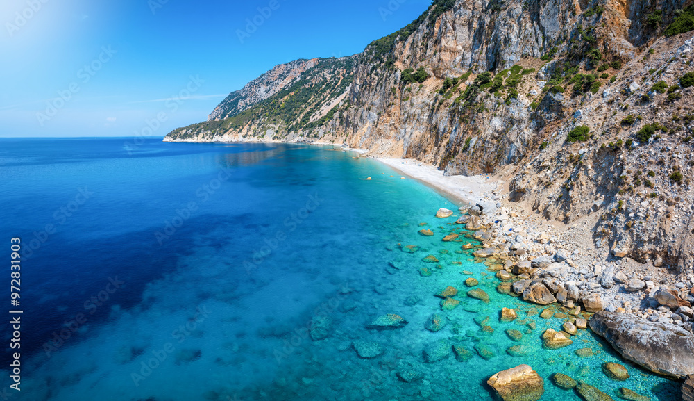 Obraz premium The beautiful coast of Alonissos island with remote beaches and pristine, emerald sea, Sporades, Greece