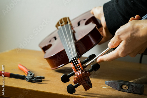 a violin being repaired