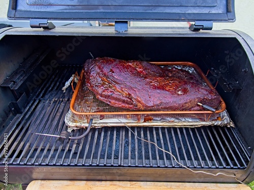 Obraz na płótnie Packer brisket on a smoker w salonie