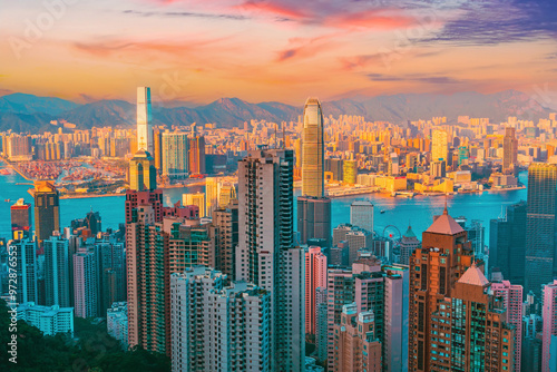 Photography Wonderful panoramic of Hong Kong city view from Victoria Peak, modern cityscape during sunset color warm in the evening with amazing sun light