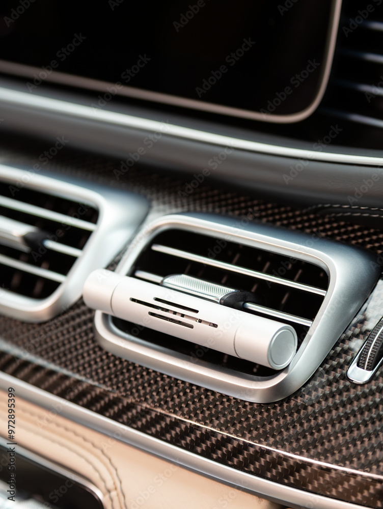 Close-up of a car air vent freshener ni new car Close-up of a car air vent freshener ni new car