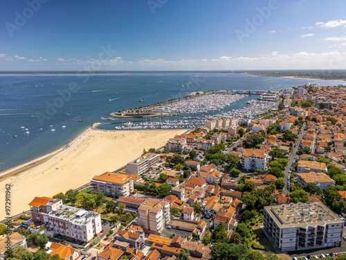 Fototapeta Naklejka Na Ścianę i Meble -  The drone aerial view of yacht marina ad the beach of  Arcachon, France. Arcachon is a commune in the southwestern French department of Gironde. It is a popular seaside resort on the Atlantic coast.