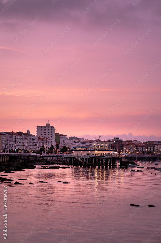 Obraz premium Castro Urdiales Spain city skyline at sunset in the atlantic