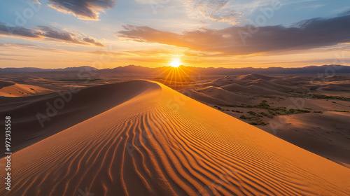 Expansive sand dunes of the Gobi desert, rippling patterns in the sand, under a golden sunset