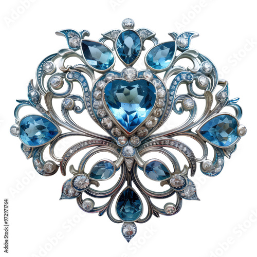 Ornate Silver Brooch Adorned with Blue Gemstones and Design Details