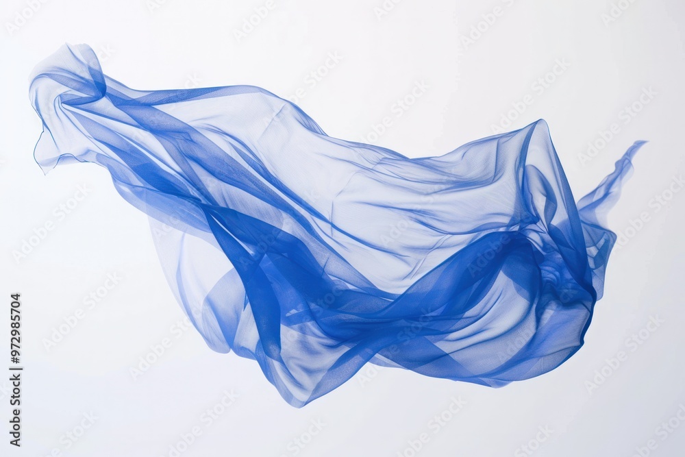 A sapphire blue plastic bag caught mid-flight, suspended in a moment of weightlessness A sapphire blue plastic bag caught mid-flight, suspended in a moment of weightlessness