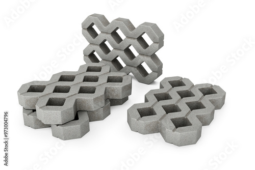 Obraz na płótnie Concrete grass pavers. Several openwork grid blocks isolated on white background - 3d rendering w salonie