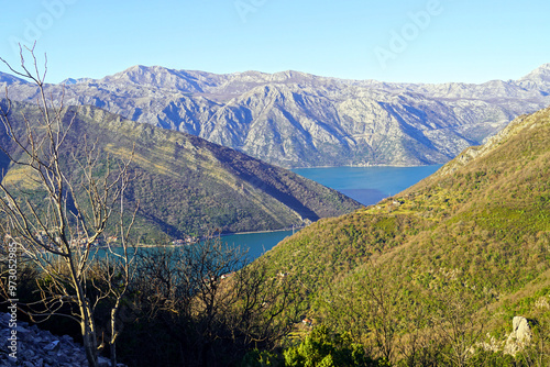 View of the Bay of Kotor from the Church of St. Vitus, built near the village of Gornja Lastva (near Tivat). Landscape with the Adriatic Sea and beautiful mountains, taken during a hike on Vrmac photo