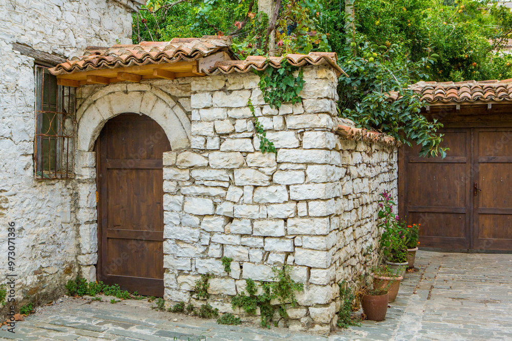 Fototapeta premium The famous old town of Berat in Albania. Picturesque street with houses from the Ottoman era. Beautiful landscape in central Albania.