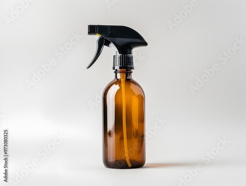 Amber Plastic Spray Bottle on Plain White Background