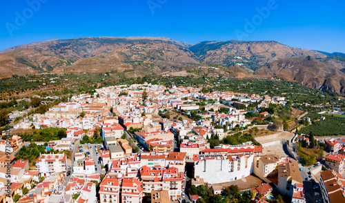 Orgiva town aerial panoramic view in Alpujarras, Spain