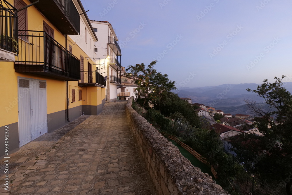 A street in Colobraro, a village in the Basilicata region of Italy. A street in Colobraro, a village in the Basilicata region of Italy.