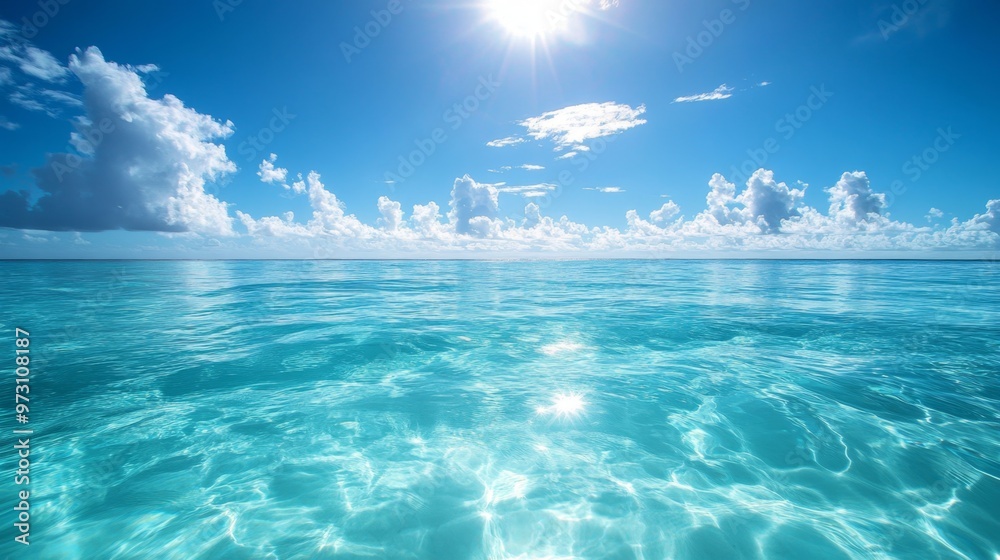 Obraz premium Serene Panoramic View of Remote Beach with Rocky Cliffs and Gentle Waves