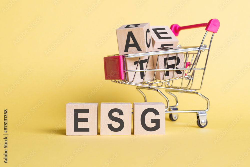 Φωτογραφία A small shopping cart filled with blocks that spell out the acronym ESG, representing Environmental, Social, and Corporate Governance