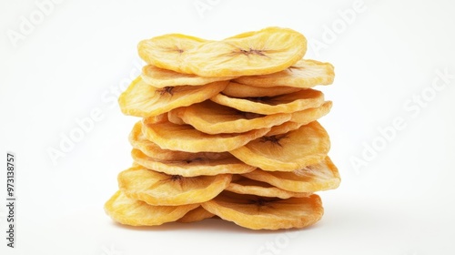 Stack of dried banana slices isolated on white background, healthy snack, organic fruit chips, vegan food