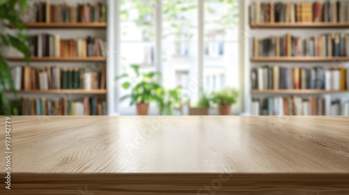 A wooden table in front of a bright room filled with books and plants.