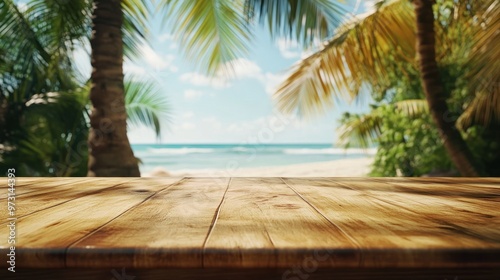 A wooden table in focus with a tropical beach and palm trees in the background.