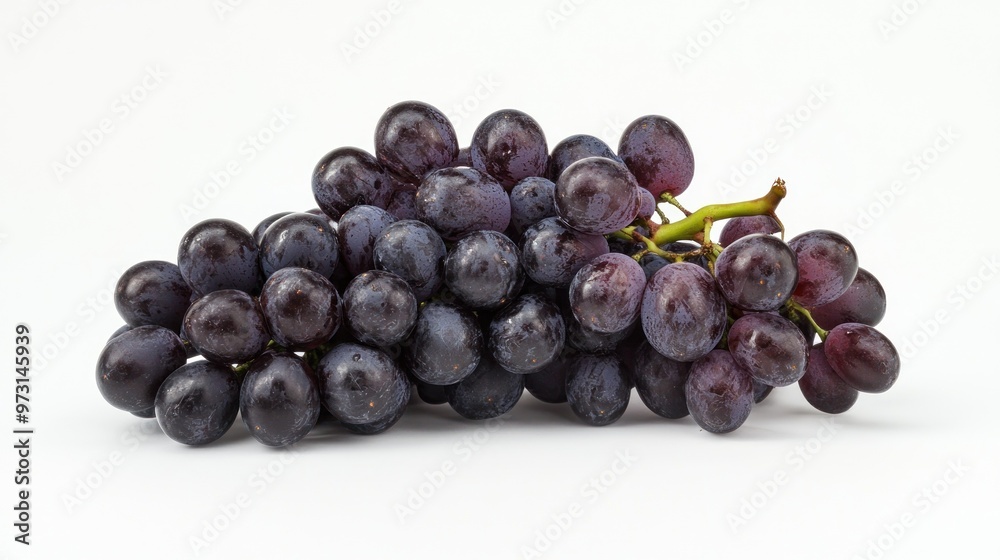 A cluster of dark purple grapes arranged on a white background. A cluster of dark purple grapes arranged on a white background.