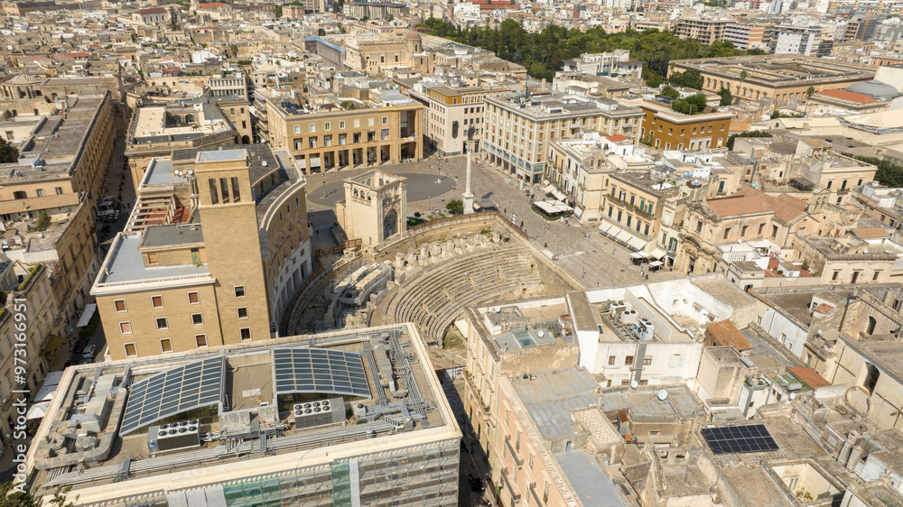 Fototapeta premium Aerial view of Sant'Oronzo square, Palazzo del Seggio and the Roman amphitheater of Lecce, In Puglia, Italy. It is for the people of Lecce the main meeting place.