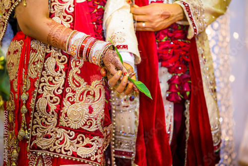 Indian Hindu wedding ritual items hands close up photo