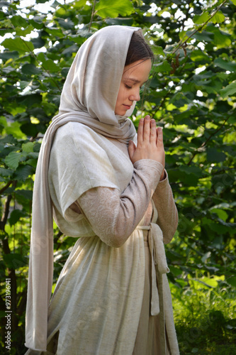 Young girl praying to God