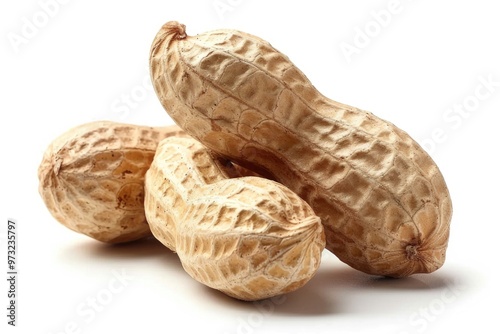 A group of peanuts piled up on top of each other photo