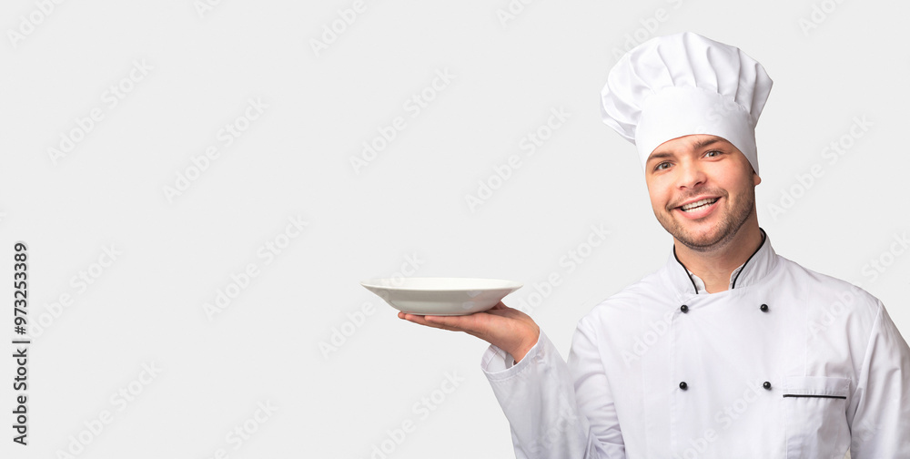 Chef Man Holding Empty Plate Smiling At Camera Standing Over White Background. Studio Shot Chef Man Holding Empty Plate Smiling At Camera Standing Over White Background. Studio Shot