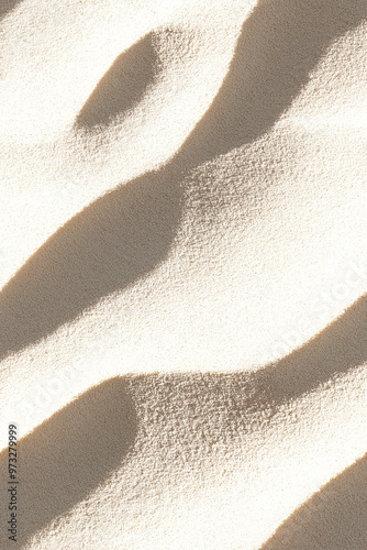 Close-up of smooth sand texture with subtle light and shadow play, creating a calming and minimalistic seamless pattern.