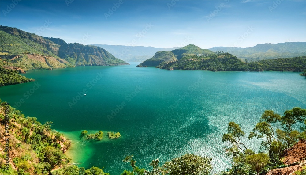 Fototapeta premium Emerald Green Waters of Lake Malawi, Surrounded by Mountains and Villages
