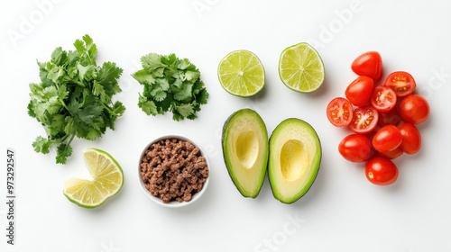 fresh taco ingredients including avocado, tomatoes, and lime photo