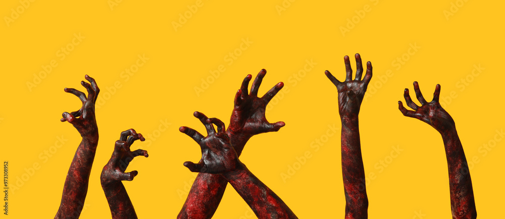 Many hands of zombies on yellow background. Halloween celebration Many hands of zombies on yellow background. Halloween celebration