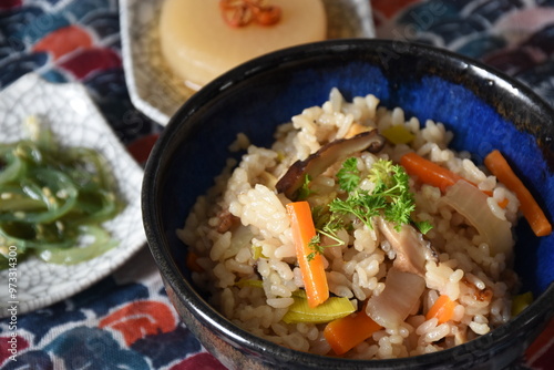 Fotografie Takikomi Gohan is a Japanese rice dish with short-grain rice with vegetables, mushrooms, seafood, or meat