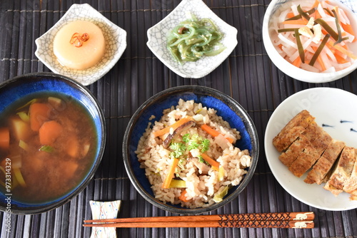 Obraz na plátně Takikomi Gohan is a Japanese rice dish with short-grain rice with vegetables, mushrooms, seafood, or meat