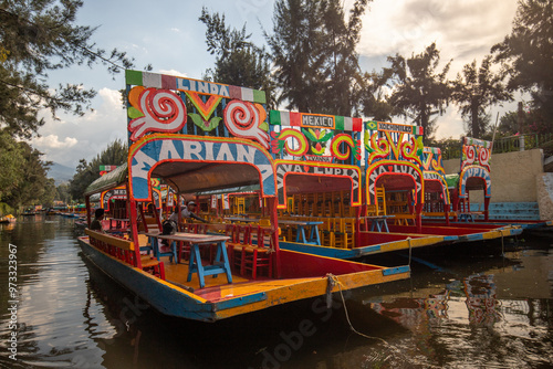 Trajineras Xochimilco, tourist area on a canal with boat rides and mariachi music in Mexico
