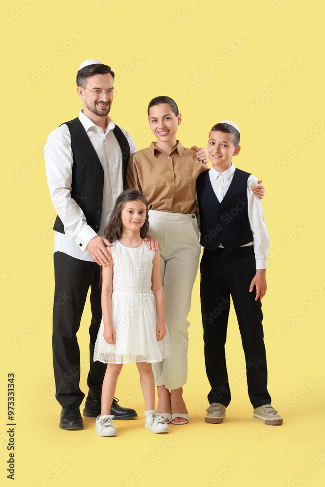 Happy Jewish family on yellow background Happy Jewish family on yellow background