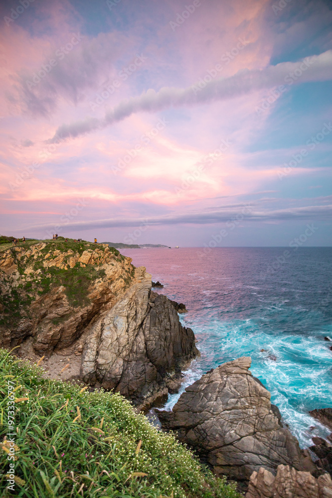 Punta Cometa viewpoint in a beautiful pink sunset in Oaxaca, Mexico Punta Cometa viewpoint in a beautiful pink sunset in Oaxaca, Mexico