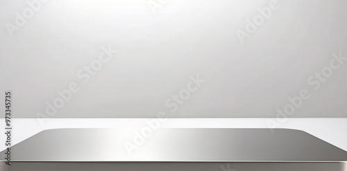 The empty silver stainless steel table top with Matte White Background. For product display