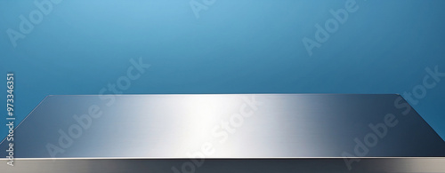 The empty silver stainless steel table top with Matte Blue Background. For product display