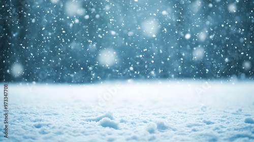 A soft, blurred snowfall background with a large, clear space for text