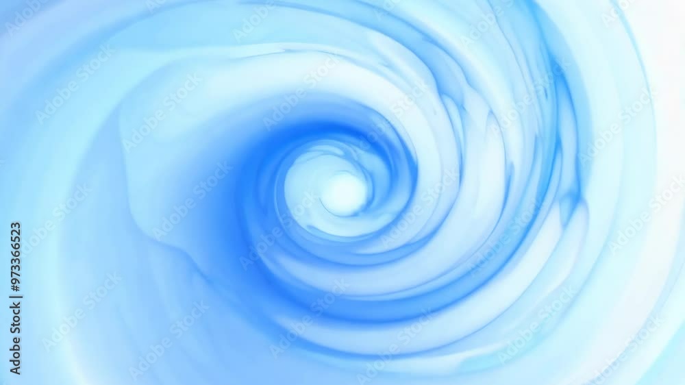 Light blue vortex with bright white center swirling in the sky Light blue vortex with bright white center swirling in the sky