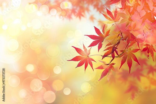 A leafy tree with red leaves and a blurry background.,