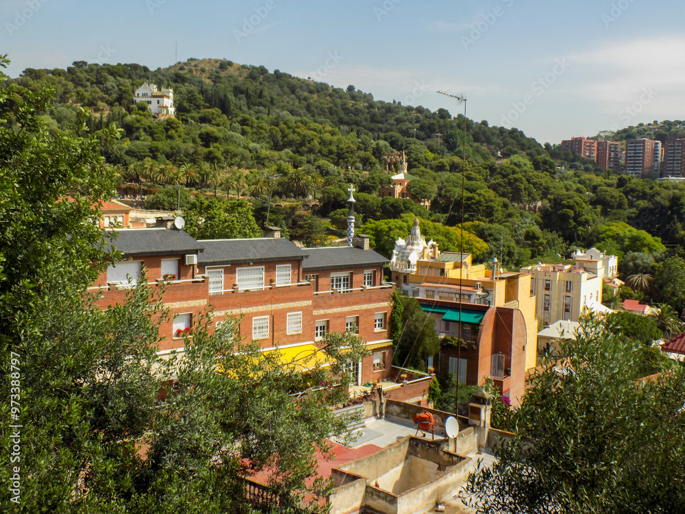 Obraz premium Parque Guell, a monument to Antonio in Barcelona, Spain, , Gaudi looking at the Main Pavilion from the top of the Park