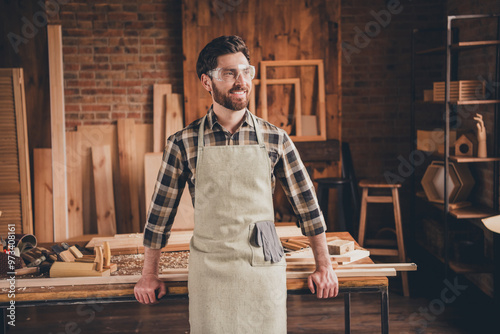 Photo of workman standing look profile side in workshop garage photo